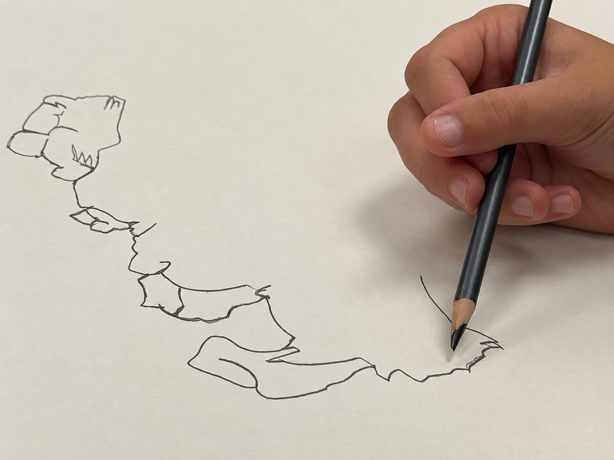 Homeschool student drawing a shell contour